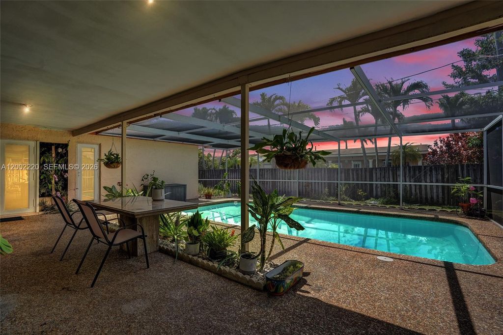 Photo of 11960 NW 31st St, Sunrise, FL 33323 (MLS # A12002220)