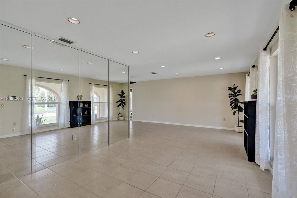 Photo of 11960 NW 31st St, Sunrise, FL 33323 (MLS # A12002220)