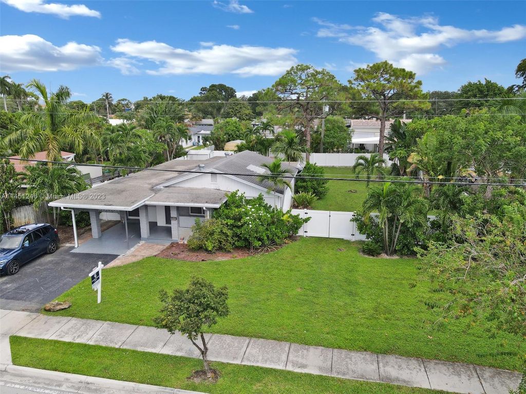 Photo of 1435 NE 38th St, Oakland Park, FL 33334 (MLS # A11451246)