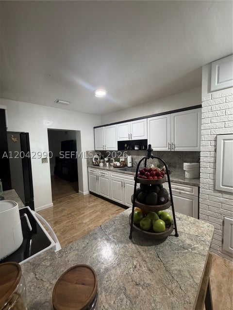Photo of 11512 NW 58th Ave, Hialeah, FL 33012 (MLS # A12042990)