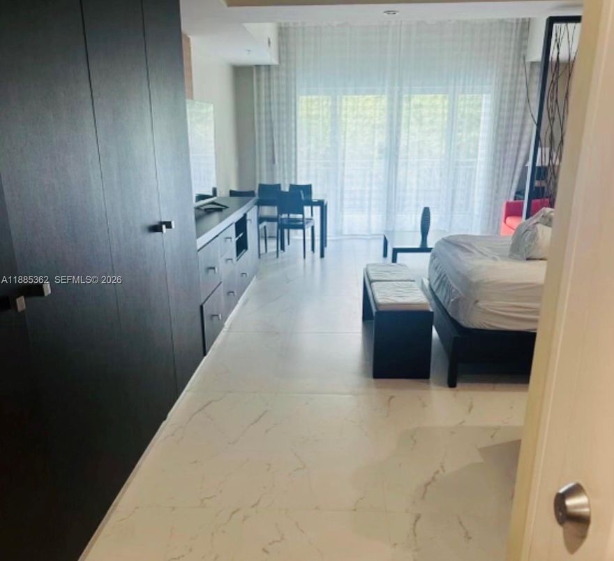 Beautifully fully furnished Condo/Hotel, Studio 705 Sq.Ft. kitchen, balcony, 1 full bath, shower and tub, Resort style, pool, spa, fitness 24 hours, excellent restaurants across from downtown Doral, at walking distance. Condo Association fee includes all utilities. enjoy a full list of massage and beauty service an equipped 24-hour fitness center. Owner can occupied 6 months and rent the rest of the year with the hotel program or by him self, some restrictions apply. Just steps away from Trump National Golf, city place and Downtown Doral. Condo fee include: Water, electricity, cable, internet. Easy to show.