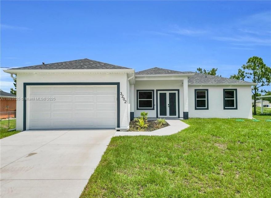 Seller's contribution of $10,000 toward buyer's closing costs. Welcome to your new home in Lehigh Acres! This beautifully New Construction Home offers 3 spacious bedrooms plus an Office, 2 full bathrooms, and a 2-car garage. Step inside to an open-concept layout featuring elegant porcelain tile flooring throughout. The modern kitchen is complete with a large island, wood cabinetry, quartz countertops, and a full package of Samsung stainless steel appliances. Built with impact-resistant windows and doors, this home offers added peace of mind and energy efficiency. Enjoy outdoor living with both an open front porch and lanai, plus a generously sized backyard. Conveniently located near major roads, shopping, and schools. Schedule your showing today!