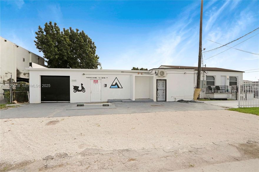 This completely remodeled building consists of three units. A 1,400 sqft warehouse bay occupied by a scooter sales business and rented for $2000/mo., a 3/2 residential unit that has been completely remodeled from head to toe including granit kitchen, glass shower, high hats, new appliances, new floor, brand new Impact windows, new bathrooms which rents from $2500-$3000, and a storange unit with some lot space fenced off in the rear and that is rented for $1,500/mo. New electric throughout, new plumbing throughout, just connected to the sewer. Clean title.