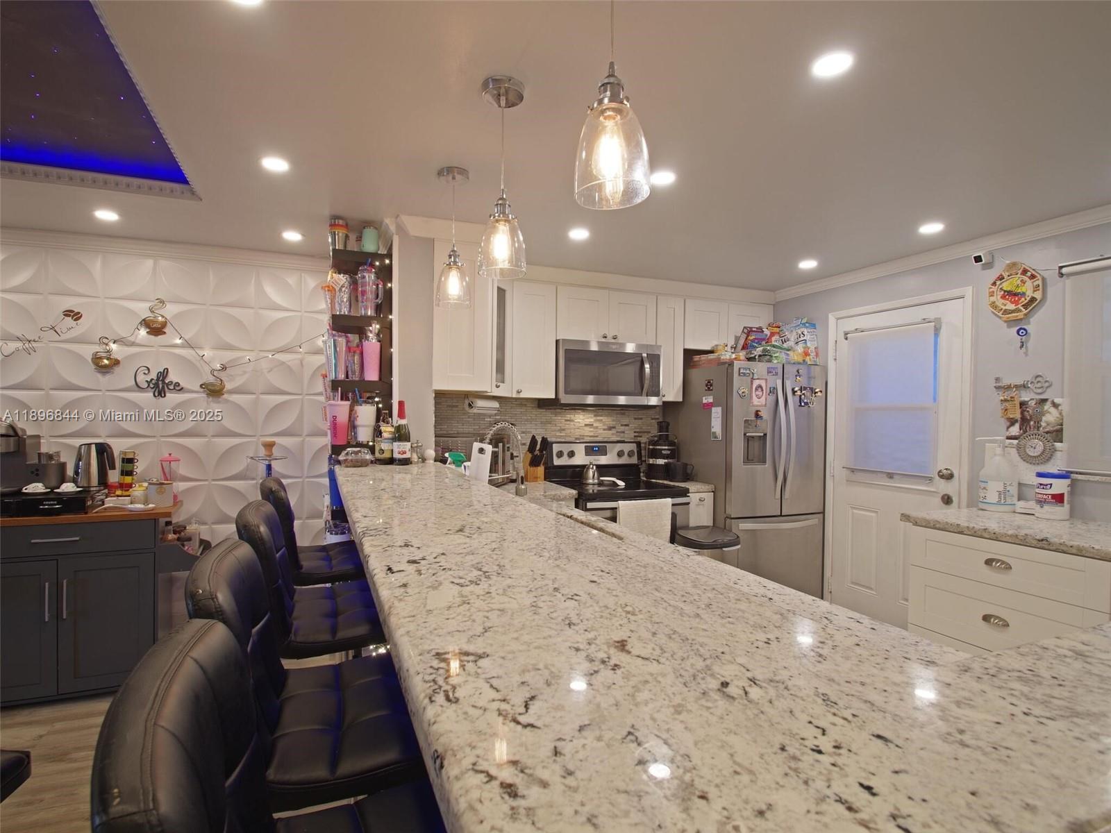 Stunning 2/2 in desired Meadowbrook Condo. This unit has been significantly remodeled and perfect location. Very close to the beach, gulfstream and Aventura Mall. Kitchen has quartz countertop and upgraded appliances. Community has a pool, gym and clubhouse perfect for hosting.