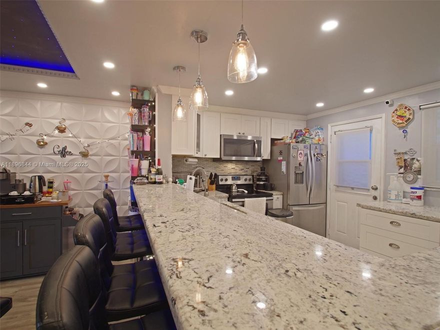 Stunning 2/2 in desired Meadowbrook Condo. This unit has been significantly remodeled and perfect location. Very close to the beach, gulfstream and Aventura Mall. Kitchen has quartz countertop and upgraded appliances. Community has a pool, gym and clubhouse perfect for hosting.