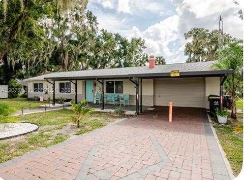 Photo of 1409 N Lake Reedy BLVD, Frostproof, FL 33843 (MLS # A12077639)