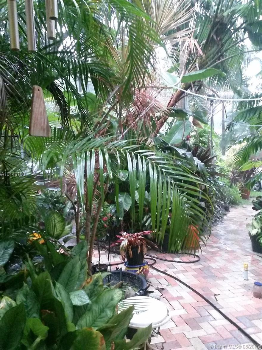 Lush-tropical North Grove Location. Family neighborhood. This 3 bedroom one bath home has a brand new granite kitchen with stainless steel appliances and brand new bathroom. Plenty of room for an addition, pool or whatever. Walking distance to Parks,Bay and Downtown Grove. Conveniently Located Only minutes to Downtown Miami, Coral Gables & Miami International. 
Fabulous Investment.  You are going to love this home!!