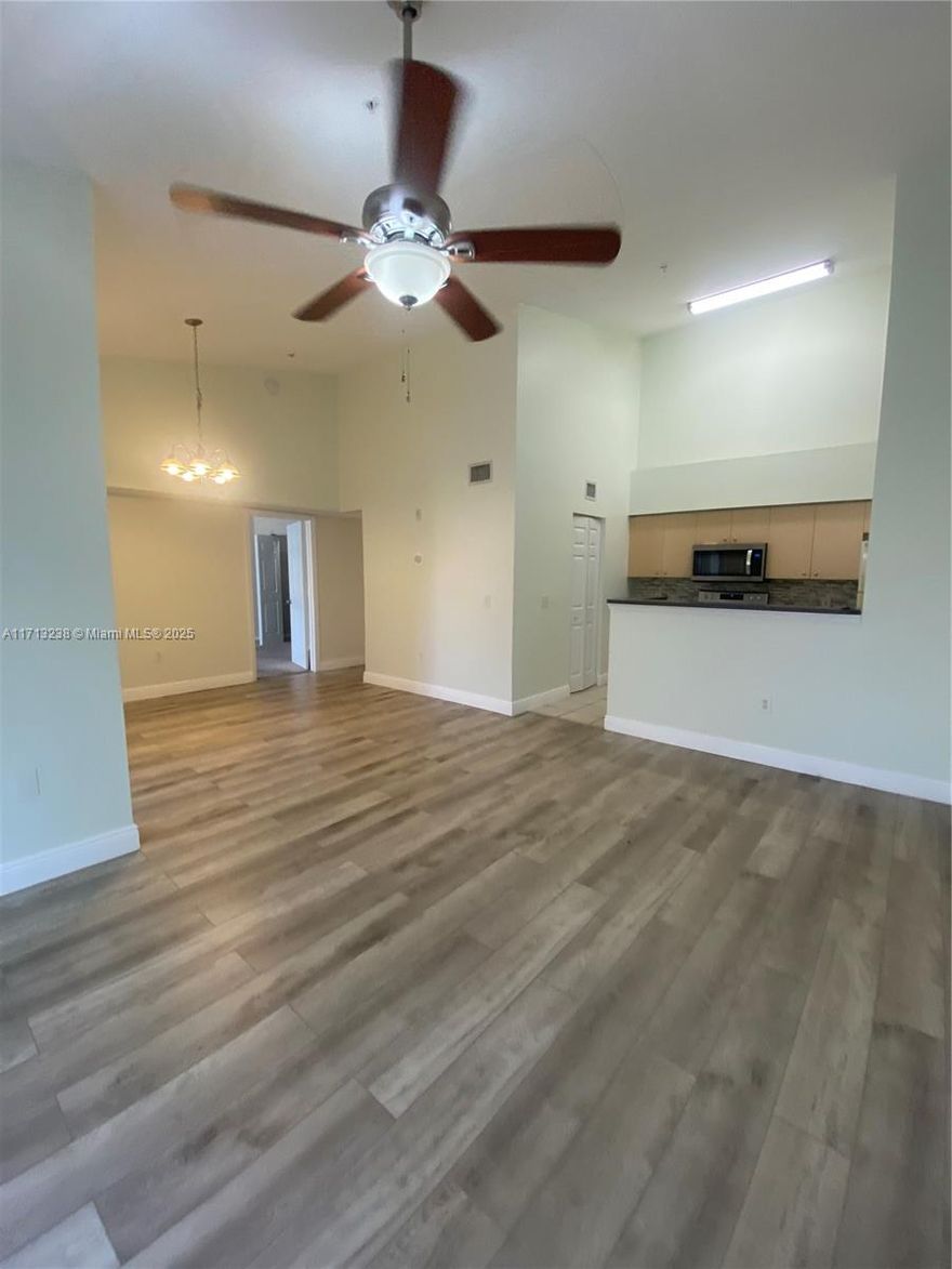 Bright and Spacious unit with vaulted ceilings that make this condo feel impressively large upon walking in. Newer AC. Washer and Dryer inside unit for added convenience. Sliding glass door in living room leads to a large, tiled balcony with awning. LOCATED IN DESIRABLE EMERALD ISLE GATED community, family friendly and quite neighborhood. Management and Security ON SITE. Basic cable and high-speed internet & water are also included in rent!! Amenities include pool/Jacuzzi, indoor racquetball/basketball, tennis courts, sanded volleyball area, fully equipped gym, business center, clubhouse with billiards room. Just miles from golf courses, beaches, shopping, I95 and the Fl. Turnpike!