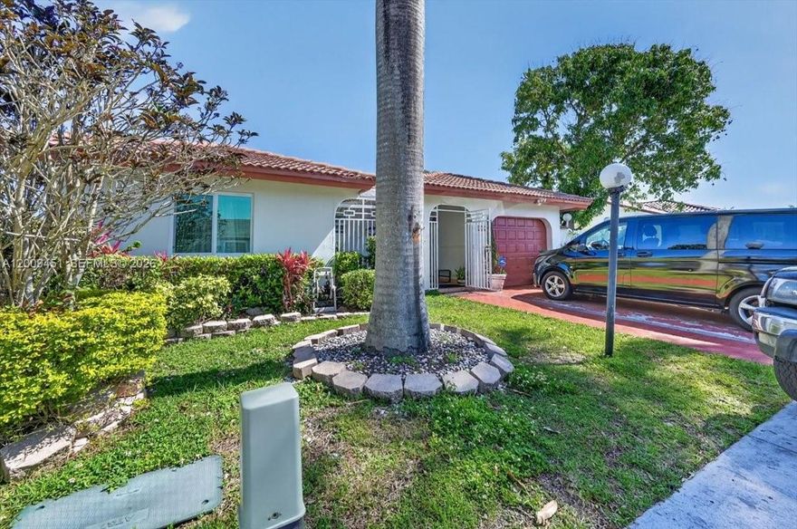 This elegant home is thoughtfully designed with a spacious, light-filled layout that blends comfort and sophistication. From the moment you step inside, you’re greeted by soaring ceilings, expansive living areas, and a seamless flow that’s perfect for both intimate gatherings and grand entertaining. Oversized windows invite in natural light, enhancing the home’s warm, modern aesthetic.

The heart of the residence, the gourmet kitchen impresses with sleek cabinetry, premium appliances, and generous counter space—ideal for hosting or everyday culinary enjoyment. The adjoining living and dining spaces create a cohesive environment that feels both elevated and inviting.

The primary suite serves as a private sanctuary, offering a spa-like bath, ample closet space, and a serene atmosphere designed for relaxation. Additional bedrooms are well-appointed and versatile, accommodating guests, family, or a dedicated home office with ease.

Step outside to a beautifully maintained backyard retreat, where lush greenery and open space set the stage for outdoor living. Whether you envision a custom pool, summer kitchen, or simply a peaceful escape under the Florida sun, the possibilities are endless.

Ideally located with convenient access to top-rated schools, shopping, dining, and major roadways, this property offers the perfect balance of privacy and connectivity.

A distinguished offering that captures the essence of luxury, comfort, and modern living in one remarkable home.