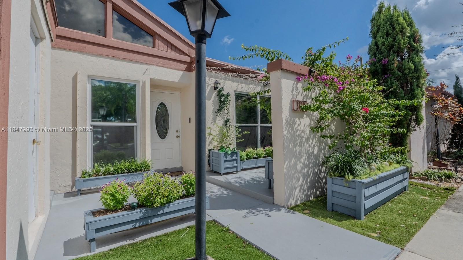 BEAUTIFUL VILLA-STYLE HOME IN A PRIME LOCATION! This charming and cozy 2-bedroom, 2-bathroom home is located in the highly desirable and peaceful community of Waterside Villas. Tastefully remodeled, it features an open layout with vinyl flooring throughout and an upgraded kitchen with stylish cabinetry and recently updated appliances. Recent improvements also include new flooring and plumbing (Permit # R-PLUM-0030352022).
Enjoy a beautiful, relaxing backyard with a patio—perfect for outdoor entertaining. LOW HOA! Several shopping plazas are right across the street, with more under construction. Ideally situated near Sawgrass Mall and major highways, this is a gem in a prime location—ready for you to call home!