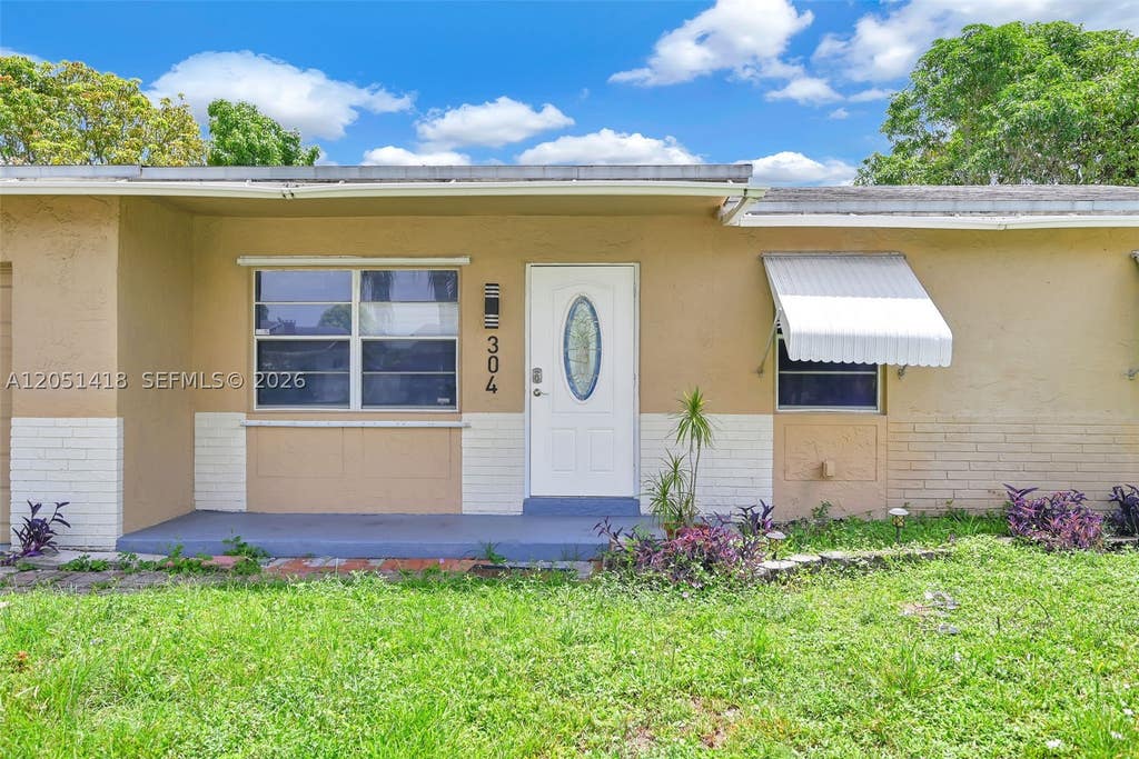 Photo of 304 SW 77th Ter, North Lauderdale, FL 33068 (MLS # A12051418)