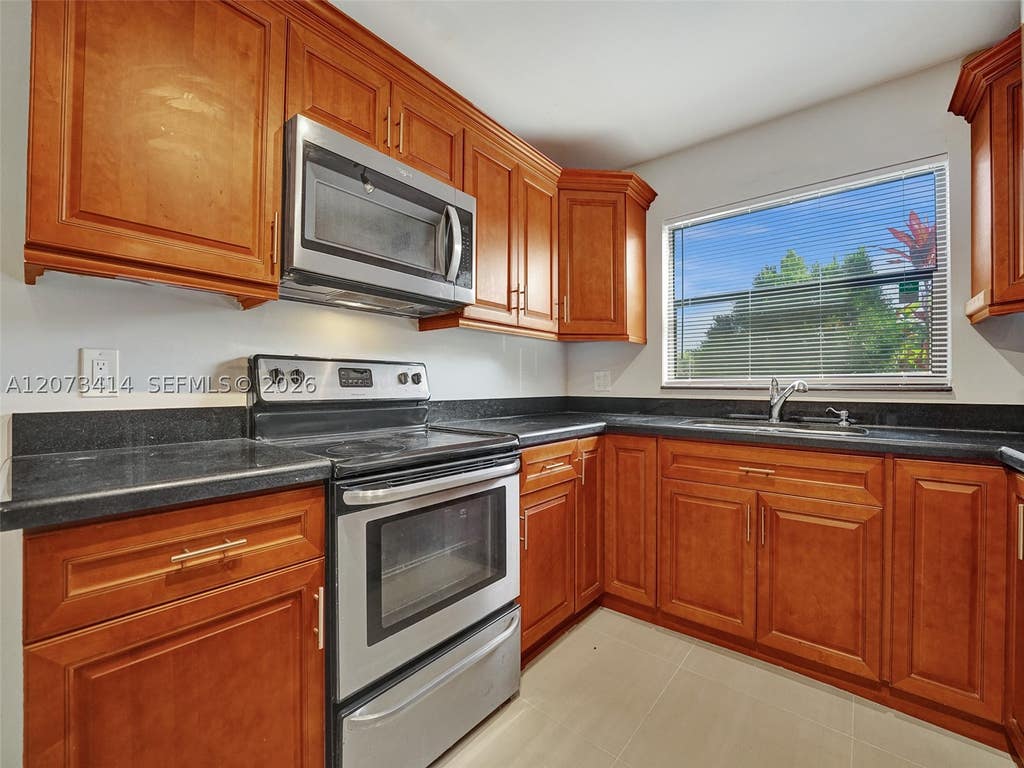 Photo of 9148 Limetree Ln #181, Pembroke Pines, FL 33024 (MLS # A12073414)