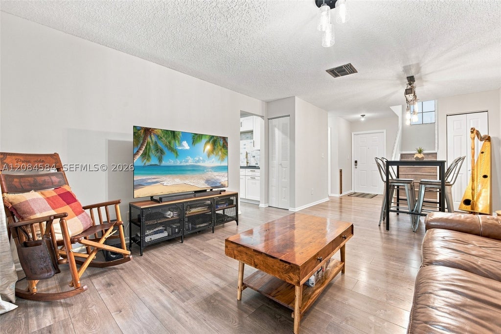 Photo of 10720 NW 11th St, Pembroke Pines, FL 33026 (MLS # A12084584)