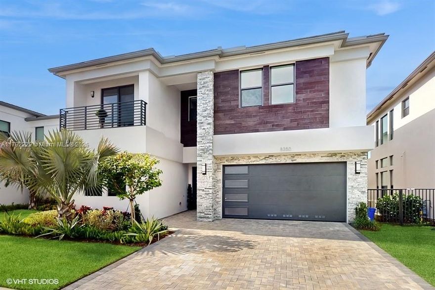 Welcome to this stunning luxury Polynesia model in Lotus Palm. Fully renovated and move-in ready, this exquisite 7-bedroom, 5-bathroom lakefront home in Lotus Palm community offers over $500,000 in upgrades and breathtaking LAKE VIEWS. Features include a bright open floor plan, gourmet kitchen with quartz countertops, premium appliances, upgraded marble tiles, wood floor upstairs, a striking modern staircase, new electric, fireplace, etc.  Private movie theater with built in bar and drink station.  Upgraded bathrooms, hurricane-impact windows, smart home technology, two-car garage. Resort-style amenities: pools, clubhouse, fitness center, tennis courts, pickleball, playgrounds, social lounges. Top-rated schools, fine dining, upscale shopping, major highways. VIRTUAL TOUR ATTACHED.