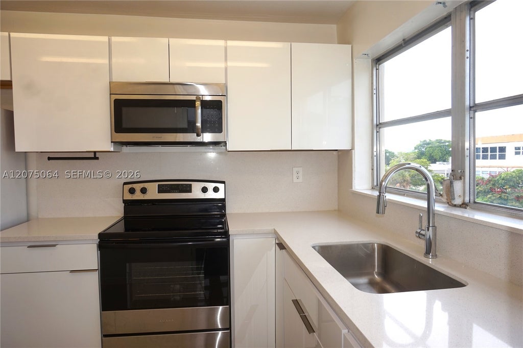 Photo of 4044 NW 19th St #404, Lauderhill, FL 33313 (MLS # A12075064)