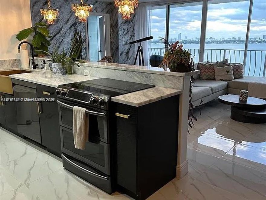 Waterfront residence in North Bay Village offering desirable south-facing bay views and excellent natural light. The unit features an open living and dining area with private balcony, well-proportioned bedrooms with ample closet storage, and an in-unit washer and dryer. One assigned parking space included. Centrally located with easy access to Miami Beach, Downtown Miami, restaurants, shopping, and major roadways.