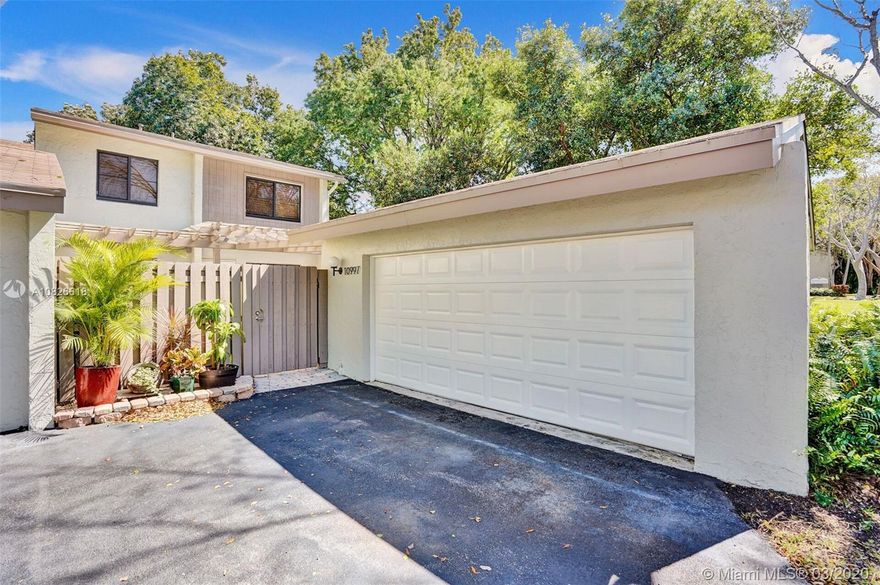 Rarely available 3/2.5 townhome w/ 2 car garage in highly desirable Sabal Chase community. This fully updated corner unit features serene outdoor living space in courtyard with pavers & comforting fountain. You enter to a tasteful living room area with wood-looking ceramic planks. The kitchen has beautiful white cabinets, farmhouse sink & SS appliances. Modern & new W&D. The family room/dining area is tastefully painted w/ 5 inch baseboards. Upstairs/stairwell flooring is bamboo wood flowing into large master w/ adjoining master bath/shower. All bedrooms upstairs with built-ins in all closets. Home has security system. Lot is surrounded by mature trees with all Sabal Chase amenities in your backyard. Show with confidence. A very tasteful elegant residence. An ExpectSuccessTeam 10+ listing.