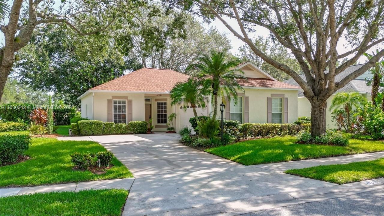 This is a captivating home, nestled on a prime corner lot with tree lined streets and parks nearby. Walk inside to discover a spacious living room that radiates warmth, making it an ideal space for relaxation or entertainment. side, the well- maintained yard, incredible trees and expansive corner lot present excellent potential for creating your own private outdoor sanctuary. This property's strategic location provides unparalleled convenience, offering easy access to a variety of nearby Lakewood Ranch amenities, including top-notch schools, bustling shopping centers, diverse restaurants, and recreational facilities. just a short drive away from pristine beaches, exceptional golf courses, and scenic parks. A well cared for home, in the heart of Lakewood Ranch. Easy access to Everything!