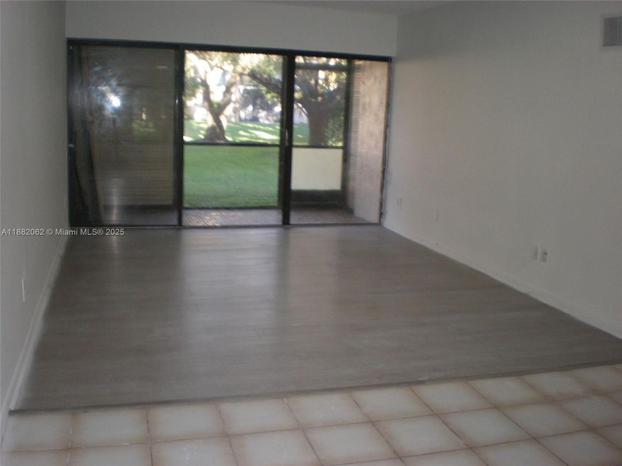 Price to sell. Great location. No rental restrictions. Freshly painted. Spacious bright first floor unit, 2 bedroom 2 bathroom.  Ceramic and laminate flooring. Screened porch overlooking a peaceful green garden.  Community offers clubhouse, pool, assigned parking and laundry facilities, close to shopping, schools, banks, transportation and major highways. Pets allowed. 680 minimum credit score required by the HOA.