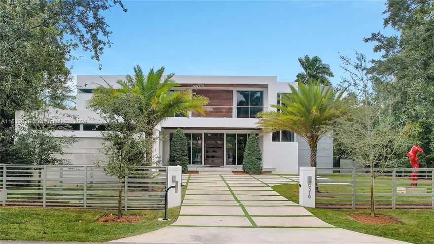 Prime North Pinecrest 7 beds / 7 baths home on a 16,003 sq ft lot! This exquisite high-end property, aprox 6,228 Sq.Ft (adjusted) is the epitome of luxury living in SoFlo. Built in 2022, this modern home features top-of-the-line finishes that radiate sophistication. Includes a state-of-the-art swimming pool, equipped with a powerful turbine for counter-current swimming, perfect for fitness enthusiasts or those seeking relaxation! Additionally, the residence includes a dual electric vehicle charging setup, marble floors, sub-zero/wolf appliances, RH chandeliers, advanced high-definition Lutron sound system provides an unparalleled auditory experience, projector with retractable cinema screen, custom cabinets, closets and much more. Near shopping and dining. **Red sculpture is not included.