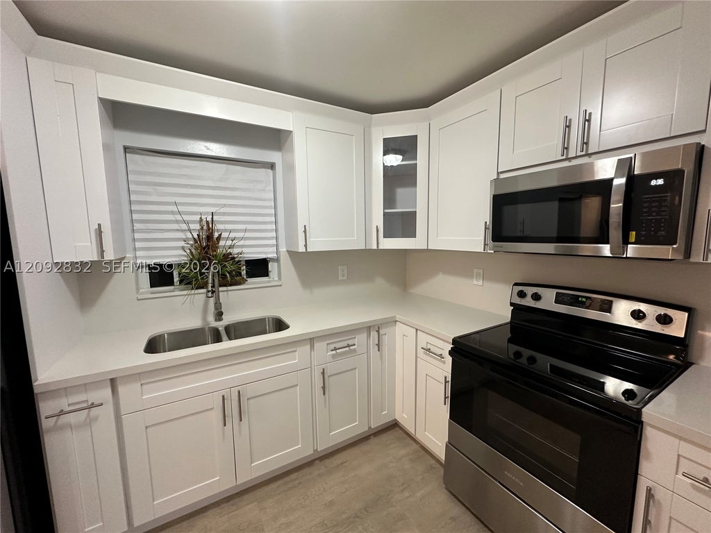 Photo of 4695 Cambridge St, Lake Worth, FL 33463 (MLS # A12092832)