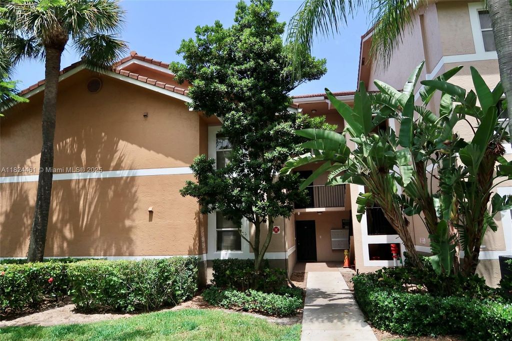 Photo of 8801 Wiles Rd #202, Coral Springs, FL 33067 (MLS # A11824461)