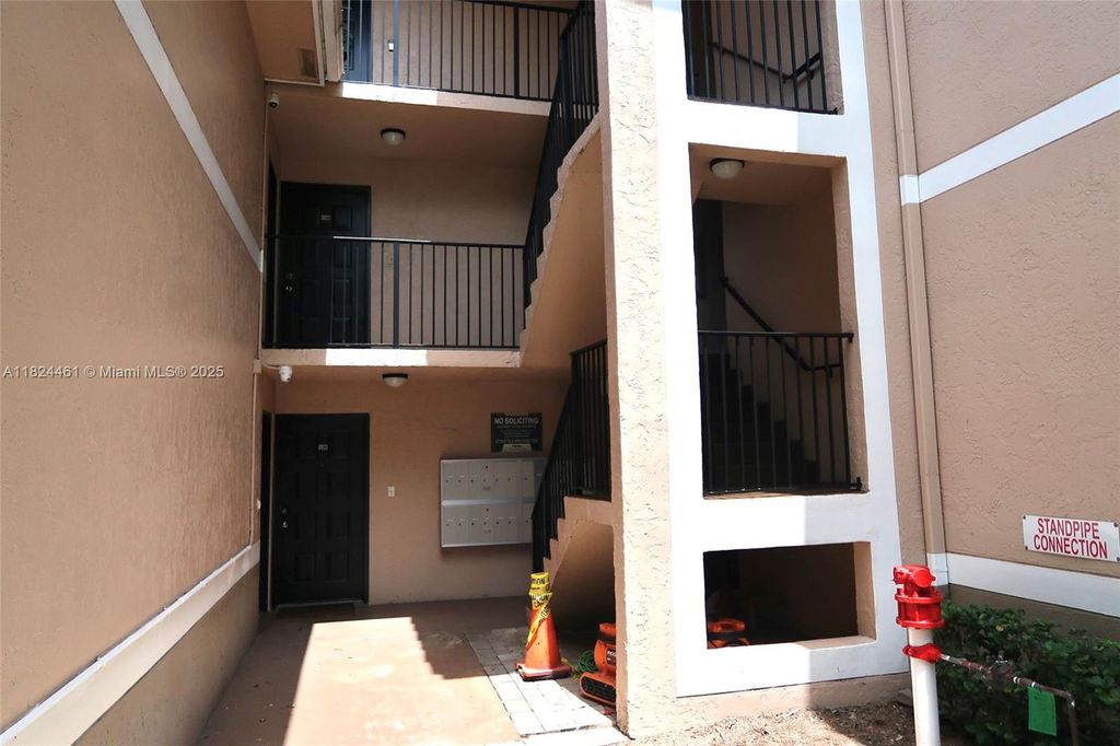 Photo of 8801 Wiles Rd #202, Coral Springs, FL 33067 (MLS # A11824461)