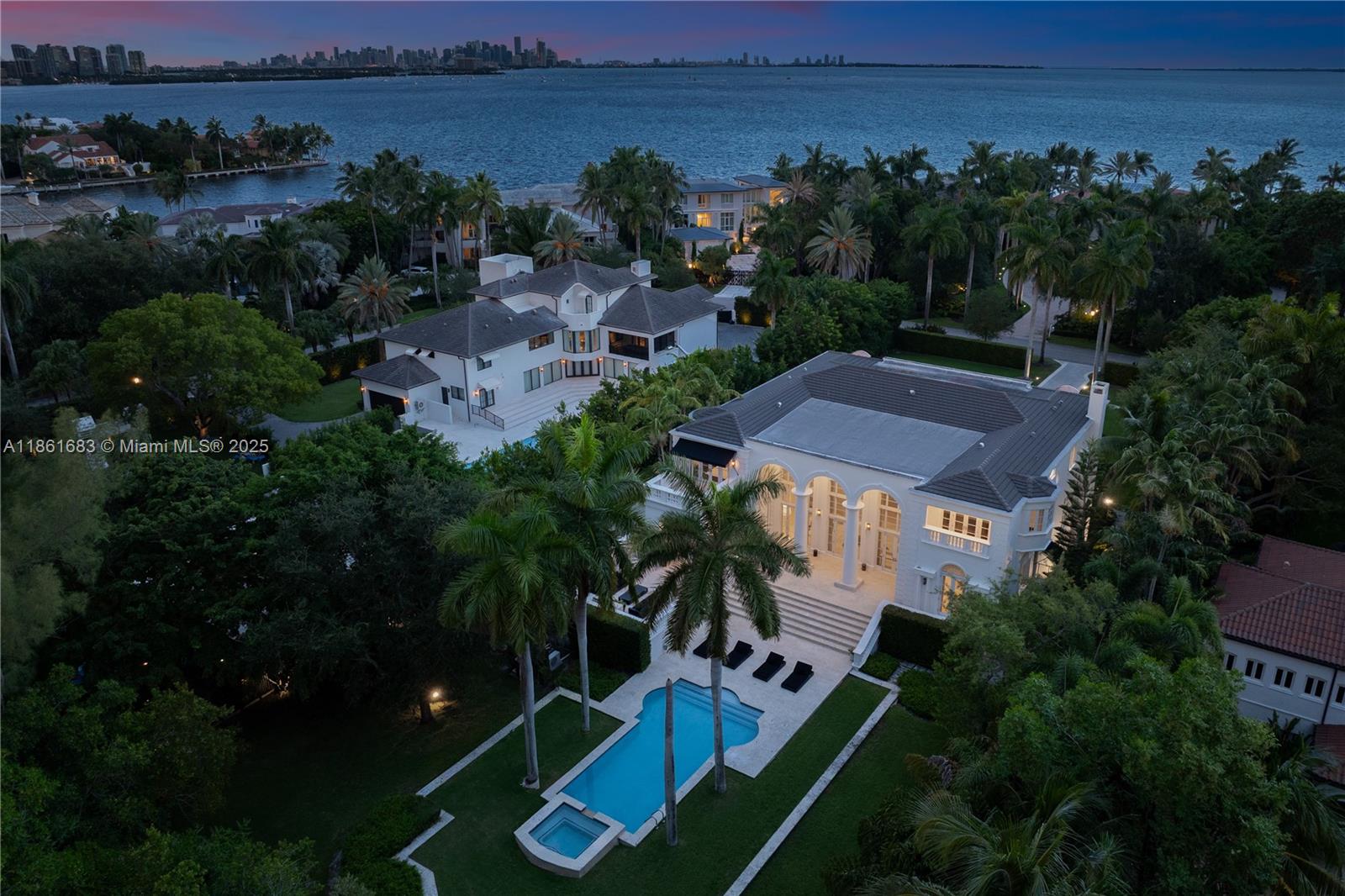 A true masterpiece of timeless elegance, this 6-bedroom, 6.2-bath estate spans over 9,400 sq. ft. in the private, guard-gated enclave of Tahiti Beach Island. Soaring double-height ceilings, marble and oak floors, and a newly designed chef’s kitchen set the stage for refined living.
Every detail has been thoughtfully curated—from the state-of-the-art movie theater to the seamless indoor-outdoor living experience. A media room, gym, and resort-style oasis with a heated pool, expansive lounge areas, and summer kitchen create the ultimate backdrop for both relaxation and entertaining.
Life at Tahiti Beach offers more than just a home—it’s a lifestyle. Residents enjoy a private beach, tennis courts, and clubhouse, along with the full amenities of Cocoplum. Avaliable furnished.