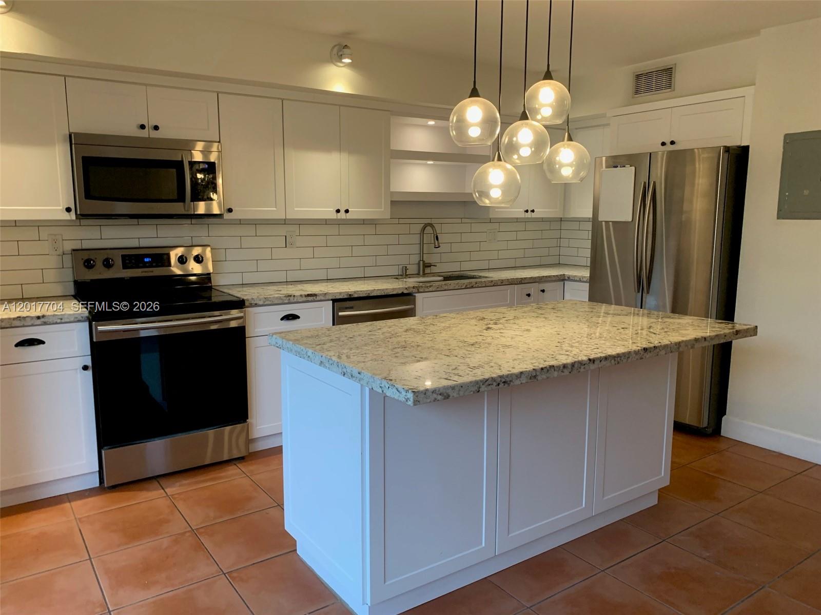 SUNSET KENDALL VILLAS - Residential