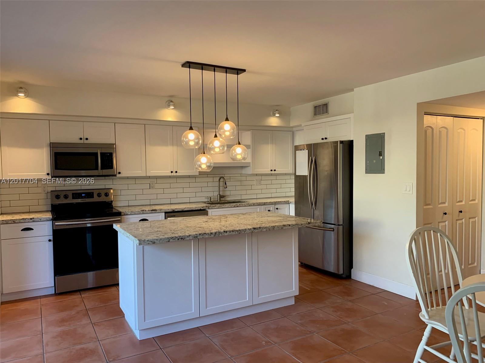 SUNSET KENDALL VILLAS - Residential