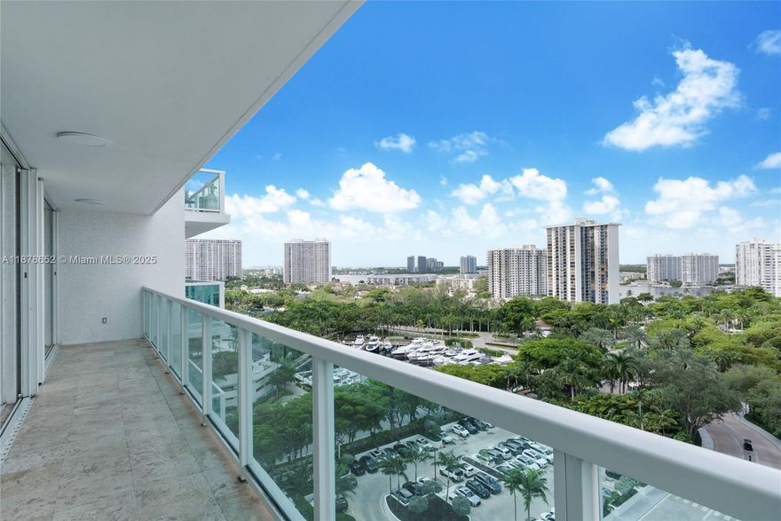 Step off the private elevator and enter the large foyer to your spacious and luxurious condo. The original owner has maintained this home to perfection. Breathtaking views of the intracoastal and ocean welcome you from the large living and dining rooms, with decorator custom built-ins throughout. Enjoy casual living in the media room, with large wine cooler . Gallery hallway leads to the bedroom wing, with 3 bedrooms, 3 baths, and terraces. Separate oversized utility/storage room, offers room for all the extras...plus large storage room of garage. Two parking spaces included. Wonderful peninsula amenities included 2 gyms, 2 pools, cafe, tennis, valet and more. best priced condo in the building.