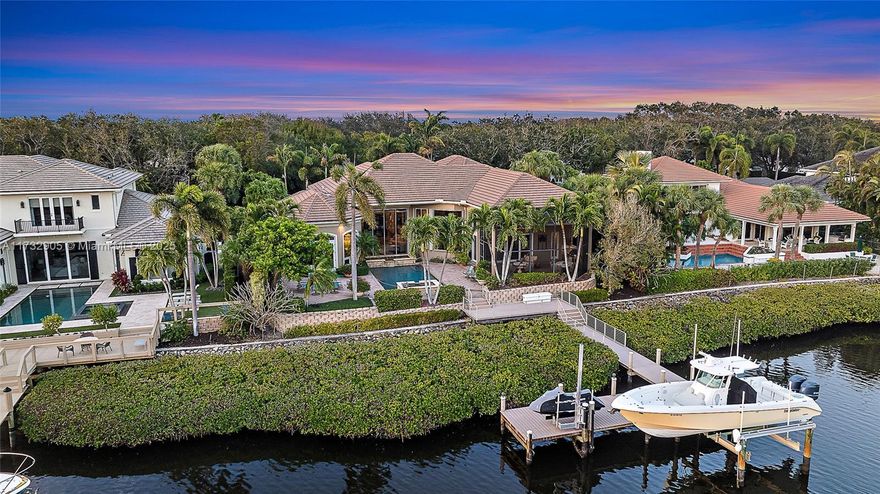 Discover the epitome of luxury living in this stunning 4-bedroom estate, perfectly situated in the prestigious Admirals Cove community. This exquisite home offers an unparalleled blend of elegance and comfort, featuring a spacious and inviting floor plan designed for both entertaining and everyday living. The open layout seamlessly connects the living, dining, and kitchen areas. Enjoy the ultimate relaxation with a private pool and spa, perfect for unwinding after a long day. Just a short stroll to The Club, you can indulge in world-class amenities and social activities. The roof was replaced in 2018, ensuring peace of mind and longevity.