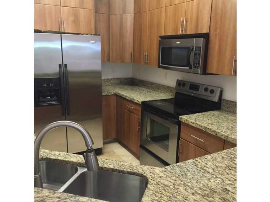 Beautiful New Mediterranean Townhouse. Plenty of space. 4 bedrooms and 3 and 1 half baths. Marble and Wood floors. Stainless steel appliances. Private pool and back yard. Pool Maintenance included. Easy to show with short notice.