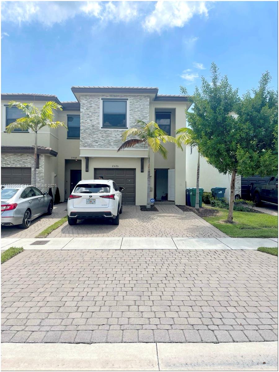 Beautifully maintained 3BD/2.5BA twin home built in 2020 featuring 1,872 sq.ft. of modern living space! Enjoy open-concept living with bright interiors, a spacious kitchen, and elegant finishes throughout. The highlight is a massive fenced backyard with a stunning covered patio—perfect for entertaining, relaxing, or adding a future pool. Plenty of parking with a 1-car garage and room for up to 5 cars in the driveway. Located in a desirable community near top schools, shops, and major highways. Move-in ready and perfect for families or investors!