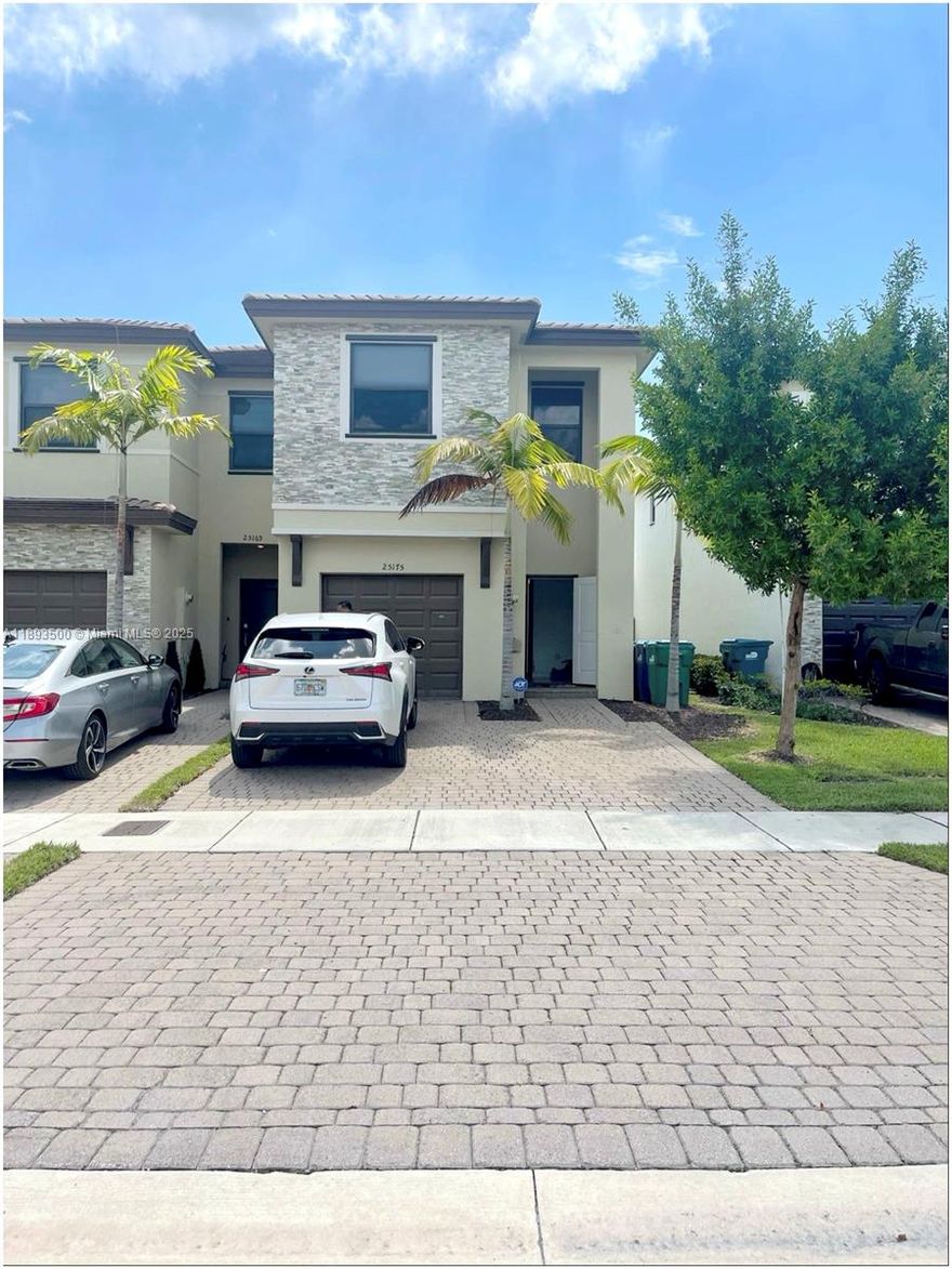 Beautifully maintained 3BD/2.5BA twin home built in 2020 featuring 1,872 sq.ft. of modern living space! Enjoy open-concept living with bright interiors, a spacious kitchen, and elegant finishes throughout. The highlight is a massive fenced backyard with a stunning covered patio—perfect for entertaining, relaxing, or adding a future pool. Plenty of parking with a 1-car garage and room for up to 5 cars in the driveway. Located in a desirable community near top schools, shops, and major highways. Move-in ready and perfect for families or investors!