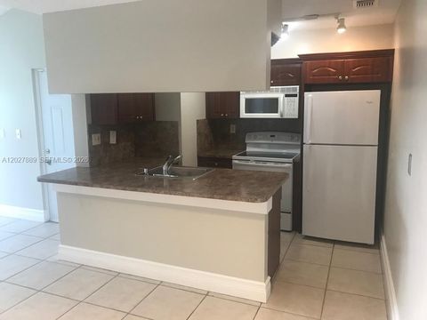 Photo of 6740 NW 175th Ln #L-20, Hialeah, FL 33015 (MLS # A12027889)
