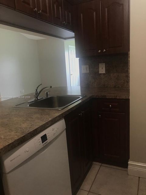 Tiny photo for 6740 NW 175th Ln #L-20, Hialeah, FL 33015 (MLS # A12027889)