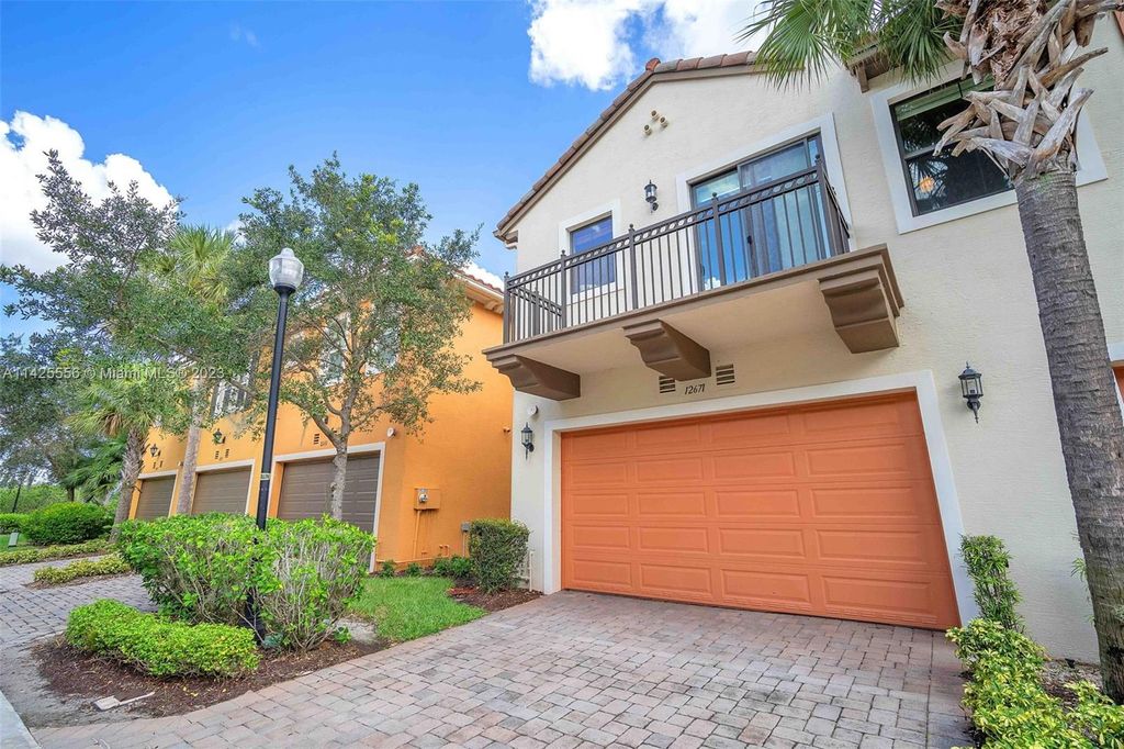 Photo of 12671 NW 32nd Pl, Sunrise, FL 33323 (MLS # A11425556)