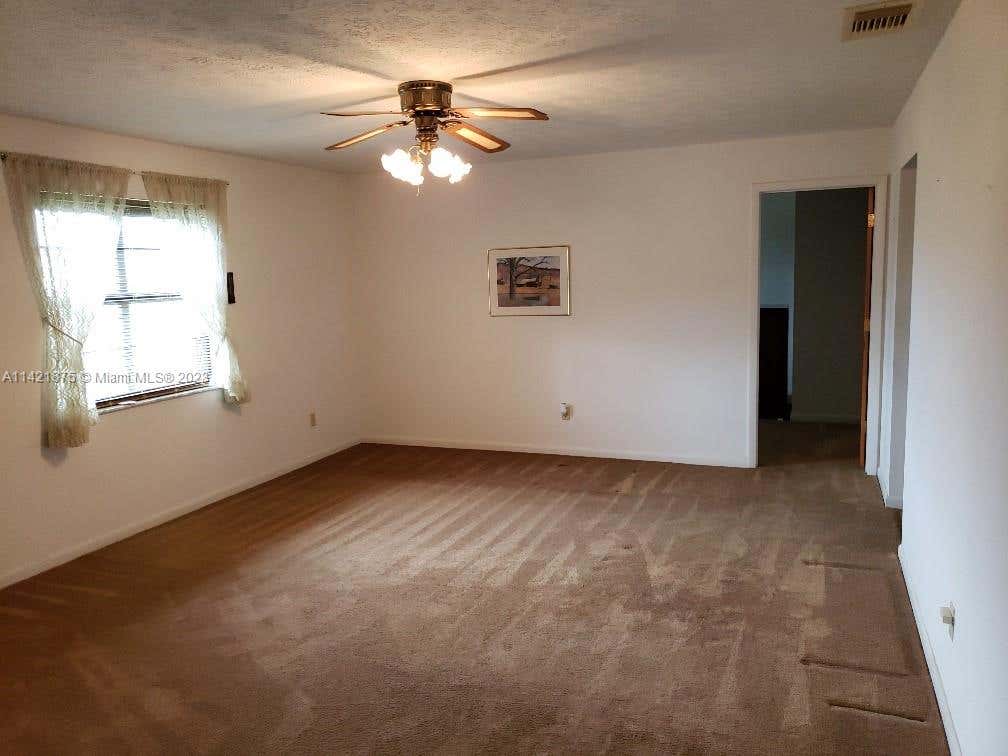 Photo of 482 SE Seahouse Dr, Port Saint Lucie, FL 34983 (MLS # A11421875)