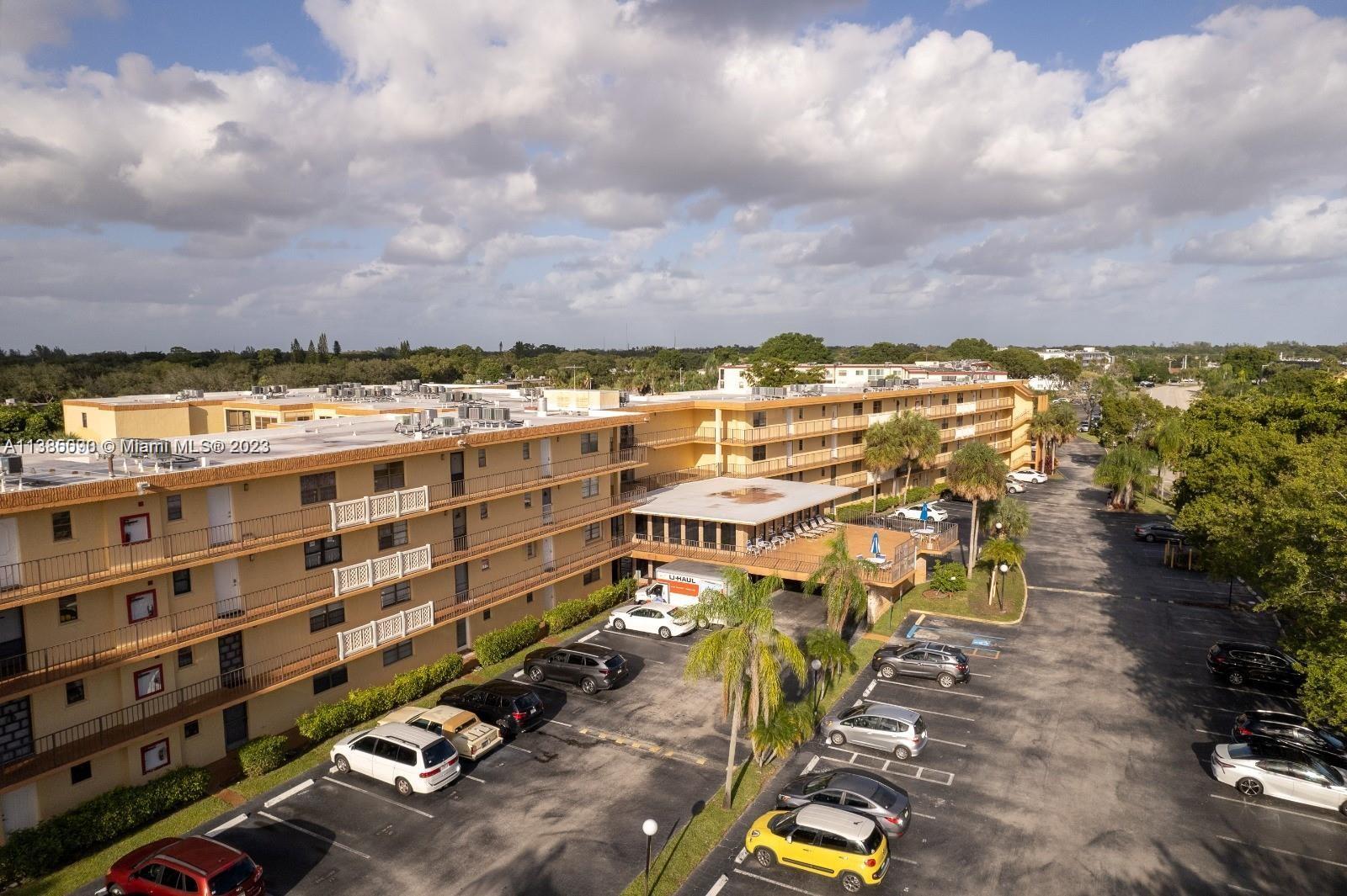2/2 condo in community, with 2 master suites! Large walk in closets, large screened in patio. Full sized washer & dryer. Elevator in building. Centrally located. Kitchen updated with Stainless Steel appliances and partially opened up to the family room. No carpet. This condo has secure lobby door & entry phone. Great Boca schools! Nice community w/ pool, separate sun deck, tennis courts & picnic area. Water, high speed internet & cable included.