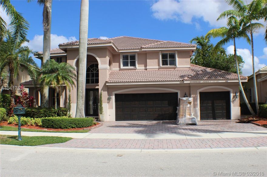 Perfectly placed on a gorgeous water lot with no neighbors behind. Immaculate Glendale model with marbled
super sized family room. Custom pool with paver patio, w/spectacular lake views. Grand master bedroom suite w/ over sized sitting area and two over sized walk in closets. Remodeled master bath, new A/Cs. All baths upgraded, crown molding. Volume ceiling, Plantations shutters, glass front doors. 42 inch cabinets, Quartz in kitchen & New SS appliances. Accordion shutters.
To open door Press Schlage and then 8165. To close press Schlage. Please, send a text message to the listing agent with your full name for the access to the complex.