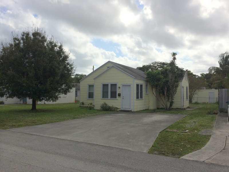 Reduced & ready for new owner. Adorable 2 bedroom 1 bath house, quaint design with fireplace, jack and jill bath, wood ceilings, separate living and dining room, laundry room,ample parking in front. Behind house is a one bedroom cottage, with small room that could be used as 2nd bedroom, updated bath. Included is a garage with a/c and laundry room. Lg. yard, partially fenced, alley access. House leased until 1/31/15, Cottage until 6/30/15. Close to public transportation. Please do not disturb tenants.