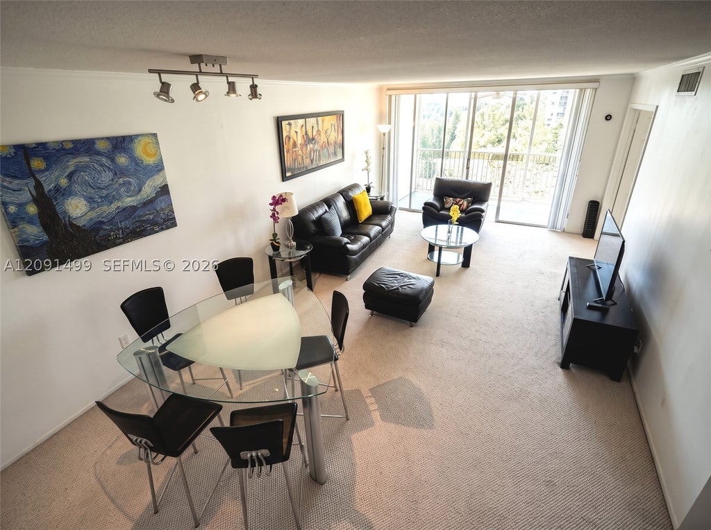 Photo of 2681 S Course Dr #511, Pompano Beach, FL 33069 (MLS # A12091499)