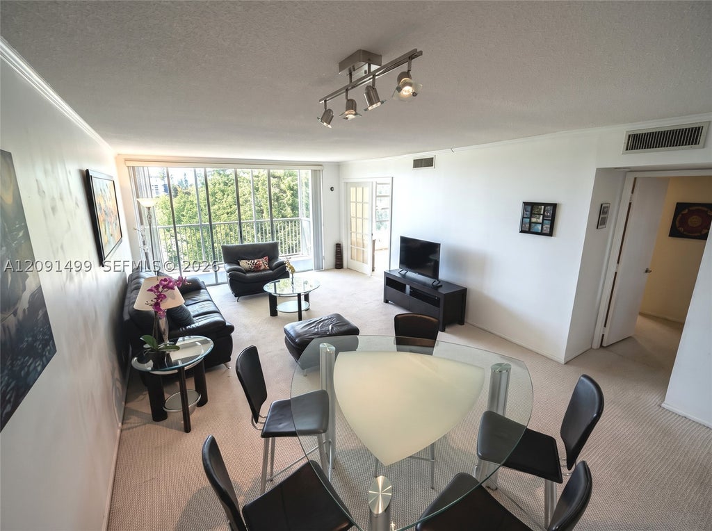 Photo of 2681 S Course Dr #511, Pompano Beach, FL 33069 (MLS # A12091499)
