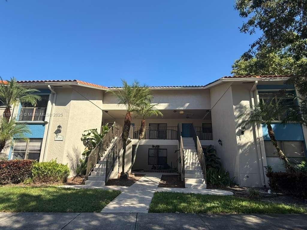 Photo of 1580 Windorah Way #E, West Palm Beach, FL 33411 (MLS # A11911390)