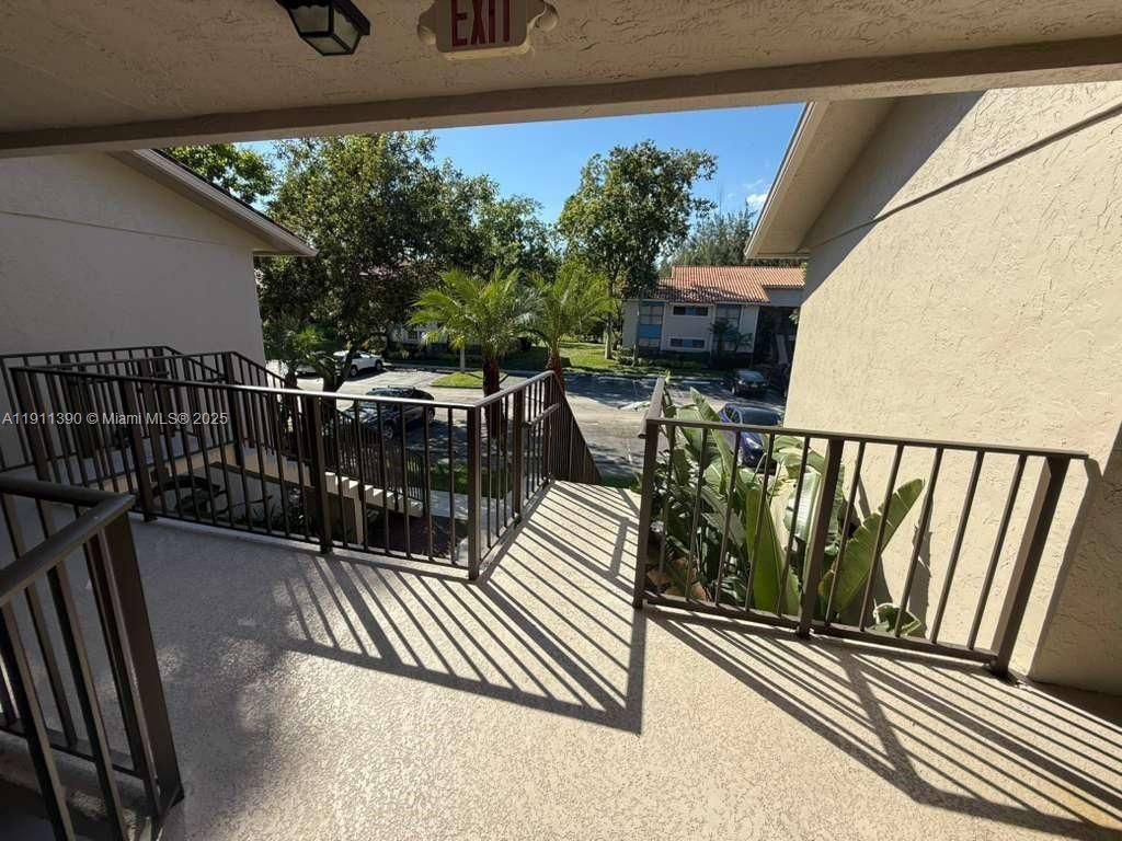 Photo of 1580 Windorah Way #E, West Palm Beach, FL 33411 (MLS # A11911390)