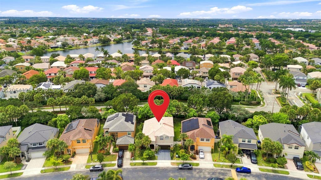 Photo of 15650 NW 12th Ct, Pembroke Pines, FL 33028 (MLS # A12064125)