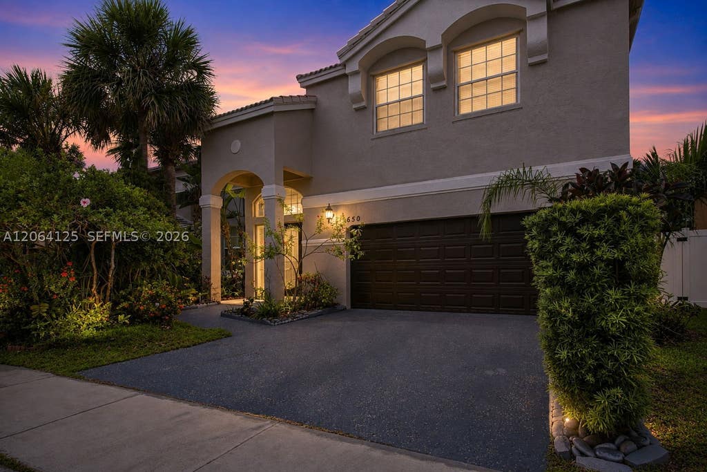 Photo of 15650 NW 12th Ct, Pembroke Pines, FL 33028 (MLS # A12064125)