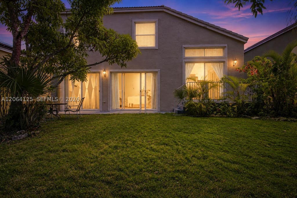 Photo of 15650 NW 12th Ct, Pembroke Pines, FL 33028 (MLS # A12064125)