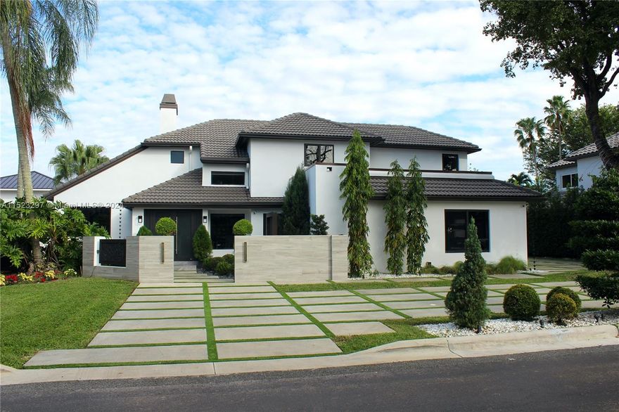 Presenting a newly remodeled Luxurious Two-Story home in the highly sought after Doral Estates. Featuring 4 bedrooms and 4 bathrooms, Impact windows and doors, Brand new
Custom Italian Veneta Cucine Kitchen with top-of-the-line appliances, and luxury porcelain floors. The exquisitely designed modern stairs lead to the second floor with a large
master bedroom with a huge walk-in closet and a large bathroom and 2 more bedrooms. All closets are custom made. Additional features include a Garage with A/C and custom
cabinetry cold kitchen, full laundry area. All modern complete surround system indoor and outdoor.The Resort style yard is one of the highlights of this home including a salt water
heated pool and jacuzzi with cascades as well as a beautiful Patio area and Putting Green.